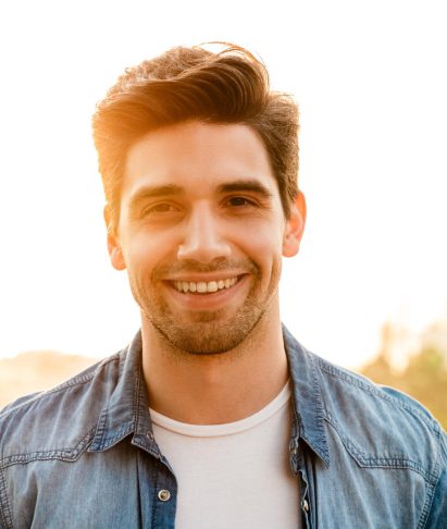 photo-of-joyful-unshaven-man-smiling-and-looking-a-2025-02-14-21-33-02-utc.jpg